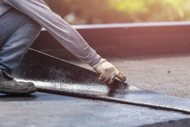 Professional Basement Waterproofing technician working in Folsom, PA